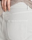 JEANS WITH DECORATIVE BUTTON